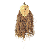 Long face tribal mask with narrow eye-holes