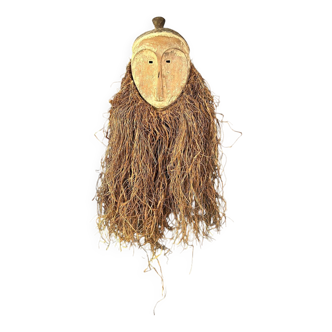 Long face tribal mask with narrow eye-holes