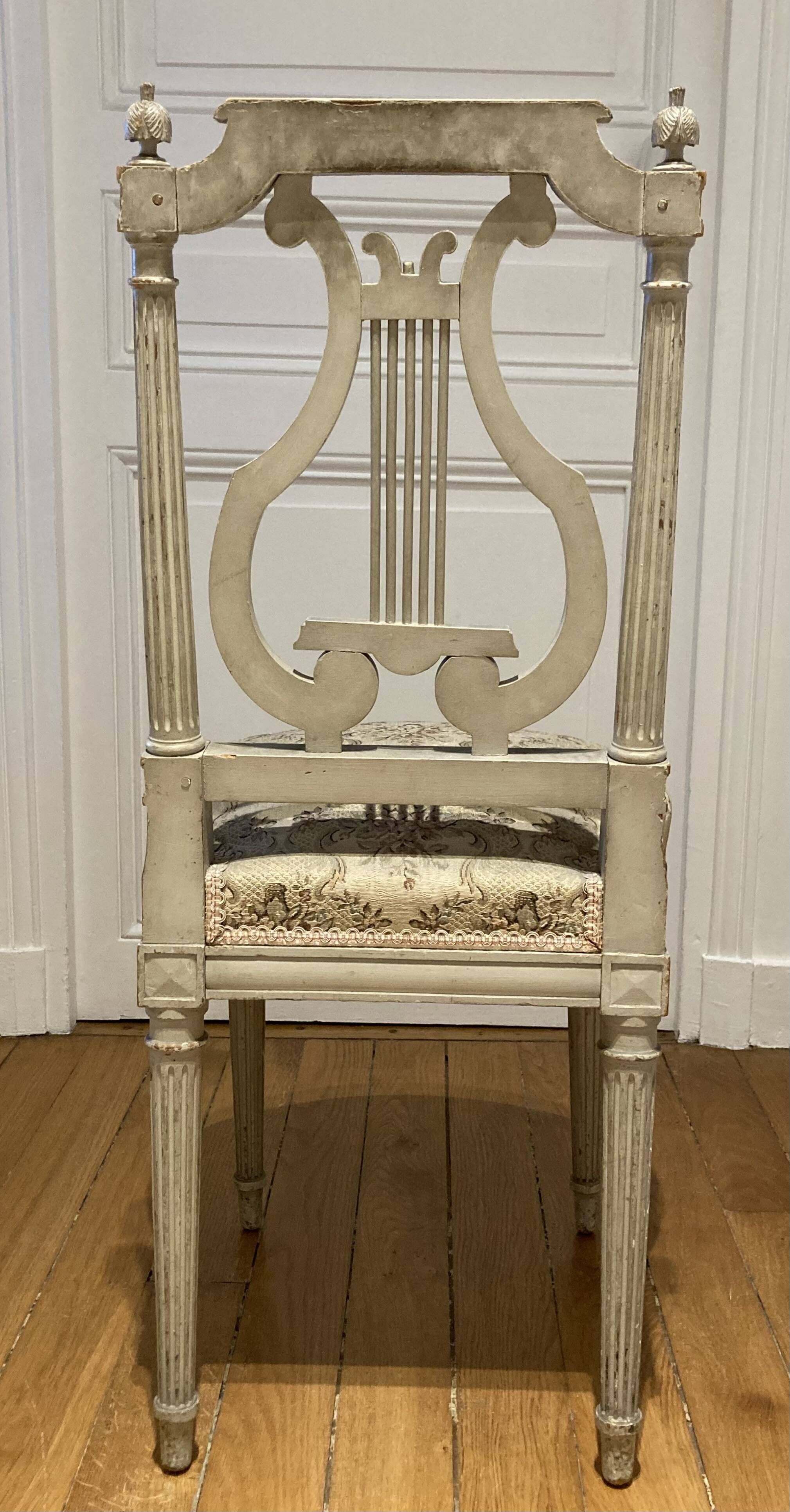 Pair of chairs, lyre back, based on a model by Jacob, Louis XVI style.
