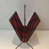 Magazine rack in black lacquered metal, leather and checkered fabric
