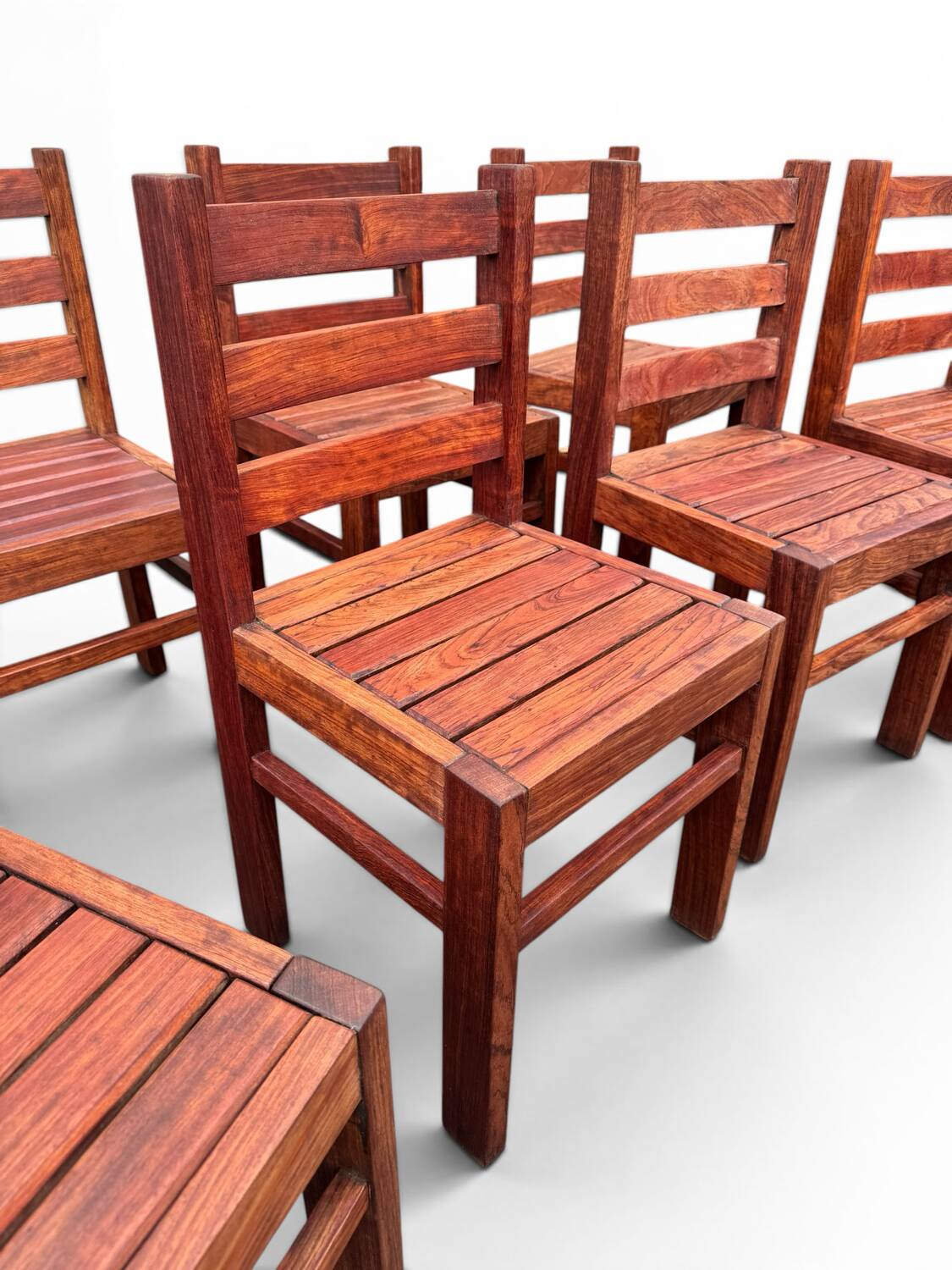 Set of 8 brutalist chairs made of solid exotic wood (essingan) from the 1960s.