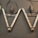 Pair of art deco glass wall lights signed dégue, hammered wrought iron.