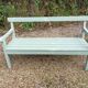 Veranda garden bench in patinated almond green solid wood