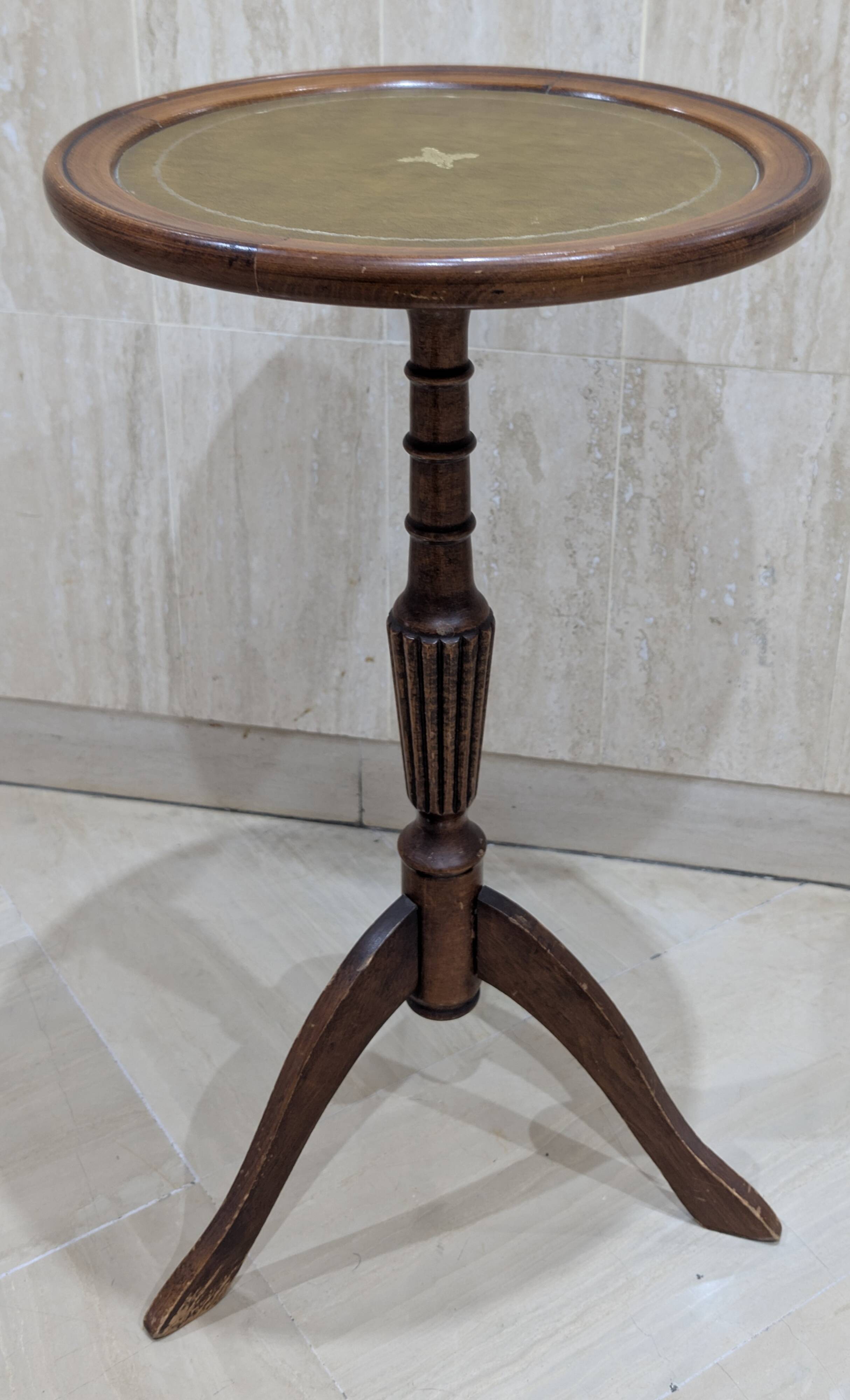 English style gueridon in wood – top covered with green/gold leather