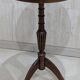 English style gueridon in wood – top covered with green/gold leather