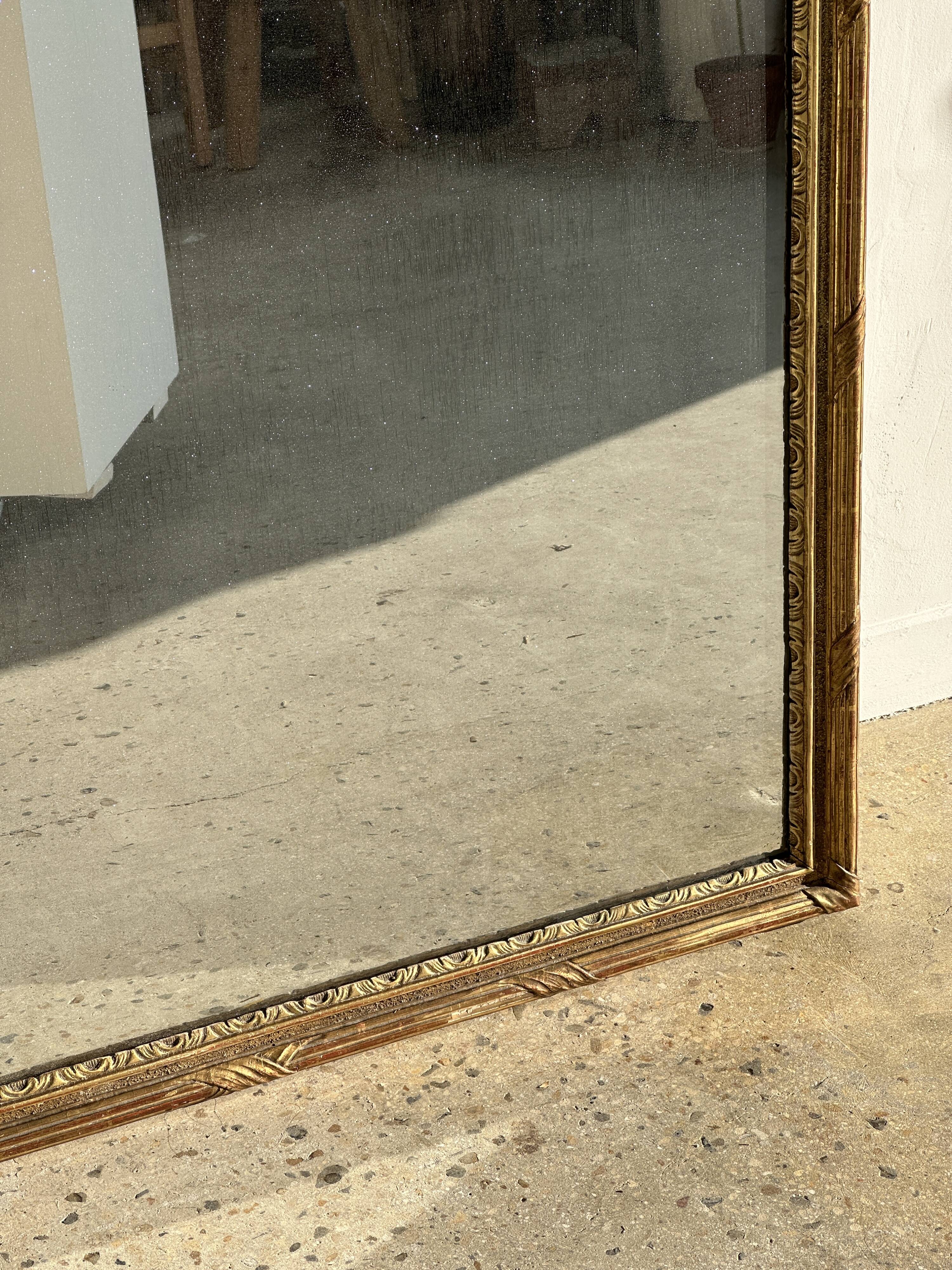 Large gilded mirror 19th century rounded corners mercury glass Louis XVI style