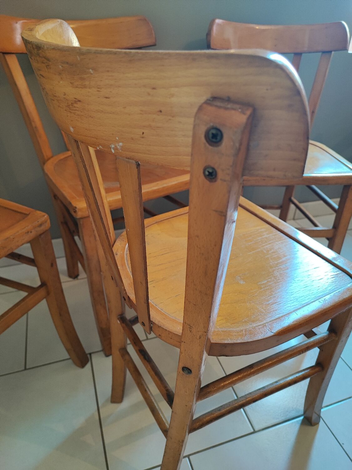 Vintage four-quarter bistro chairs