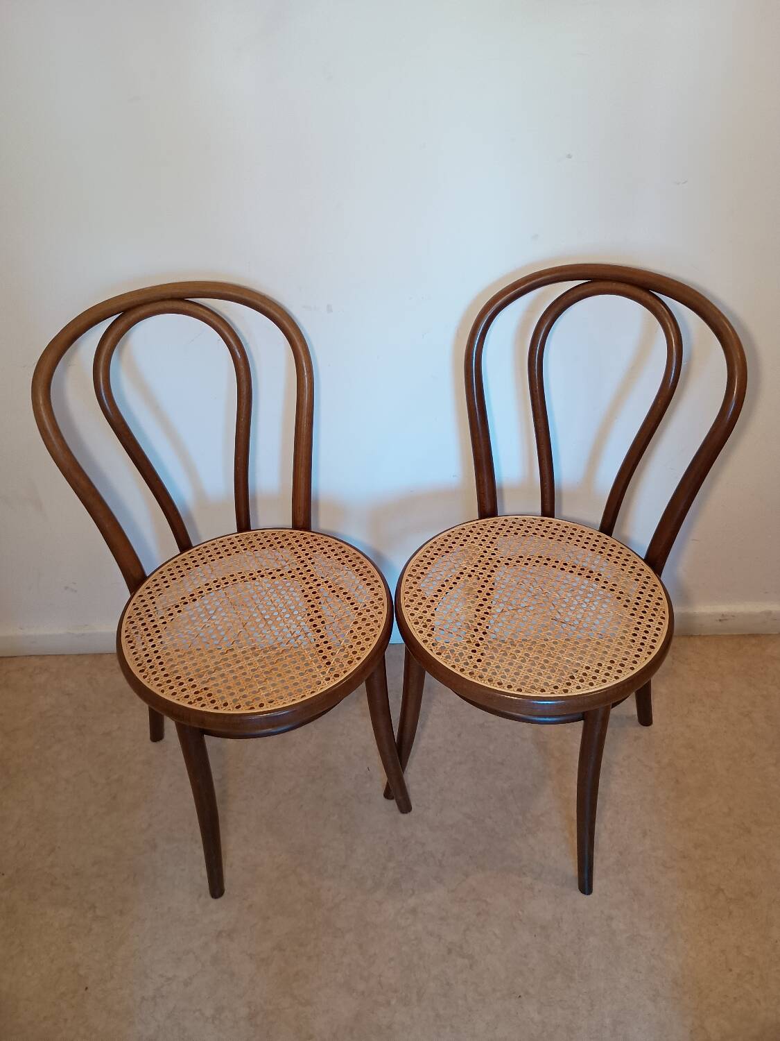Caned bistro chairs