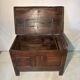 Antique rustic oak chest with original hardware and molded panels