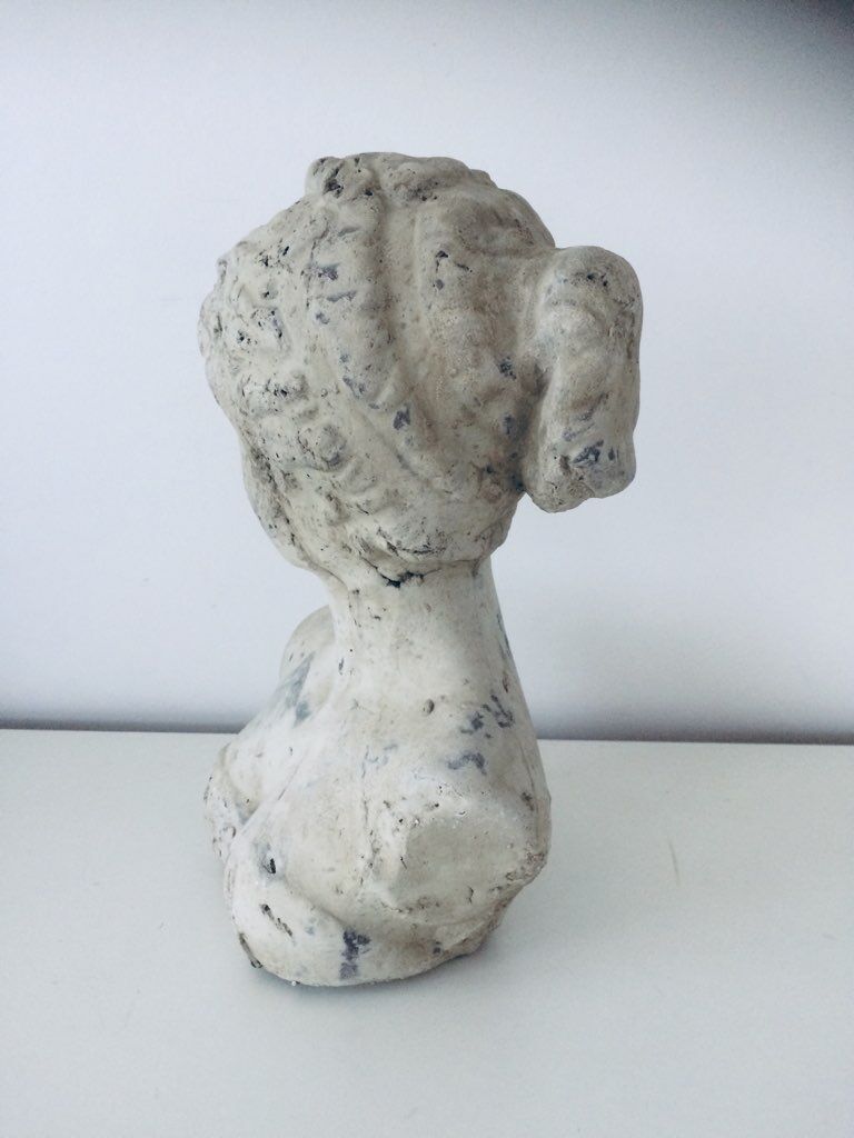 Stone and plaster bust
