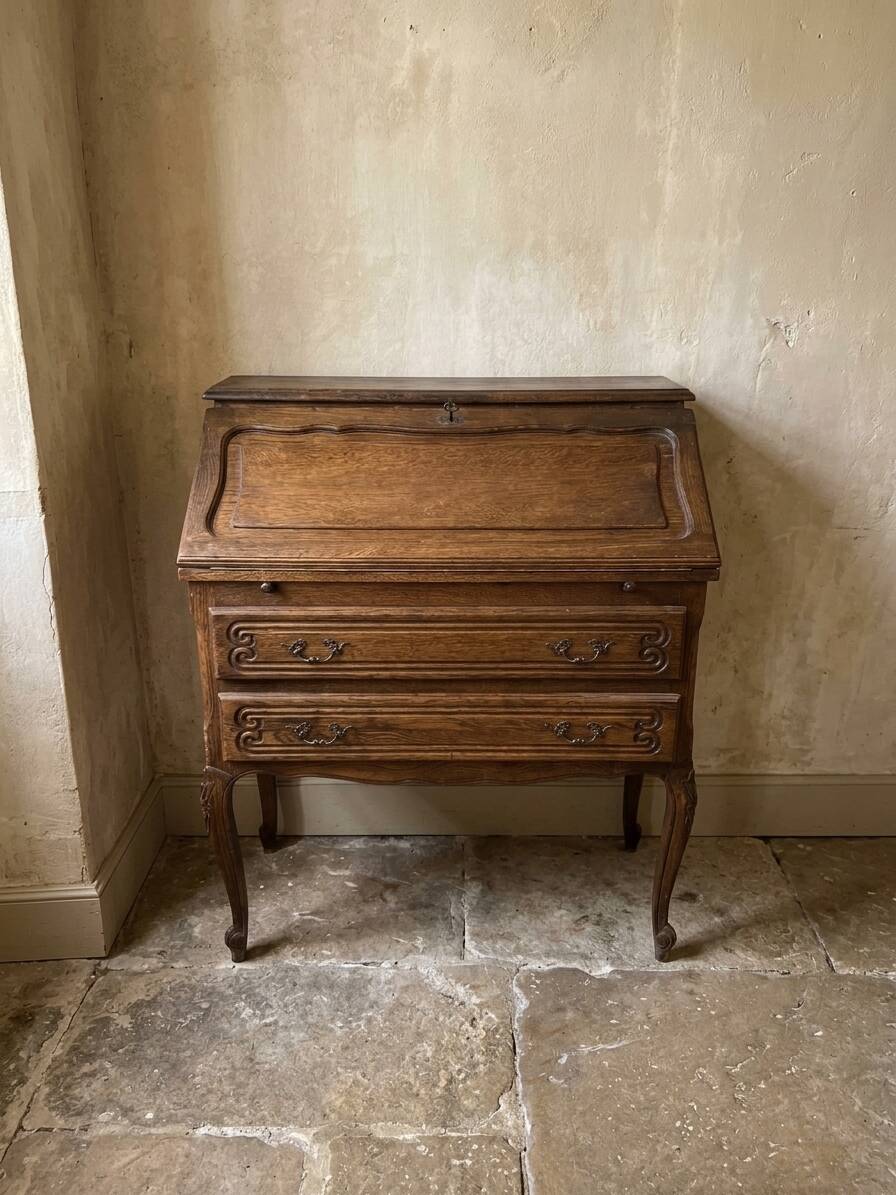 Charming antique oak secretary with drawers.