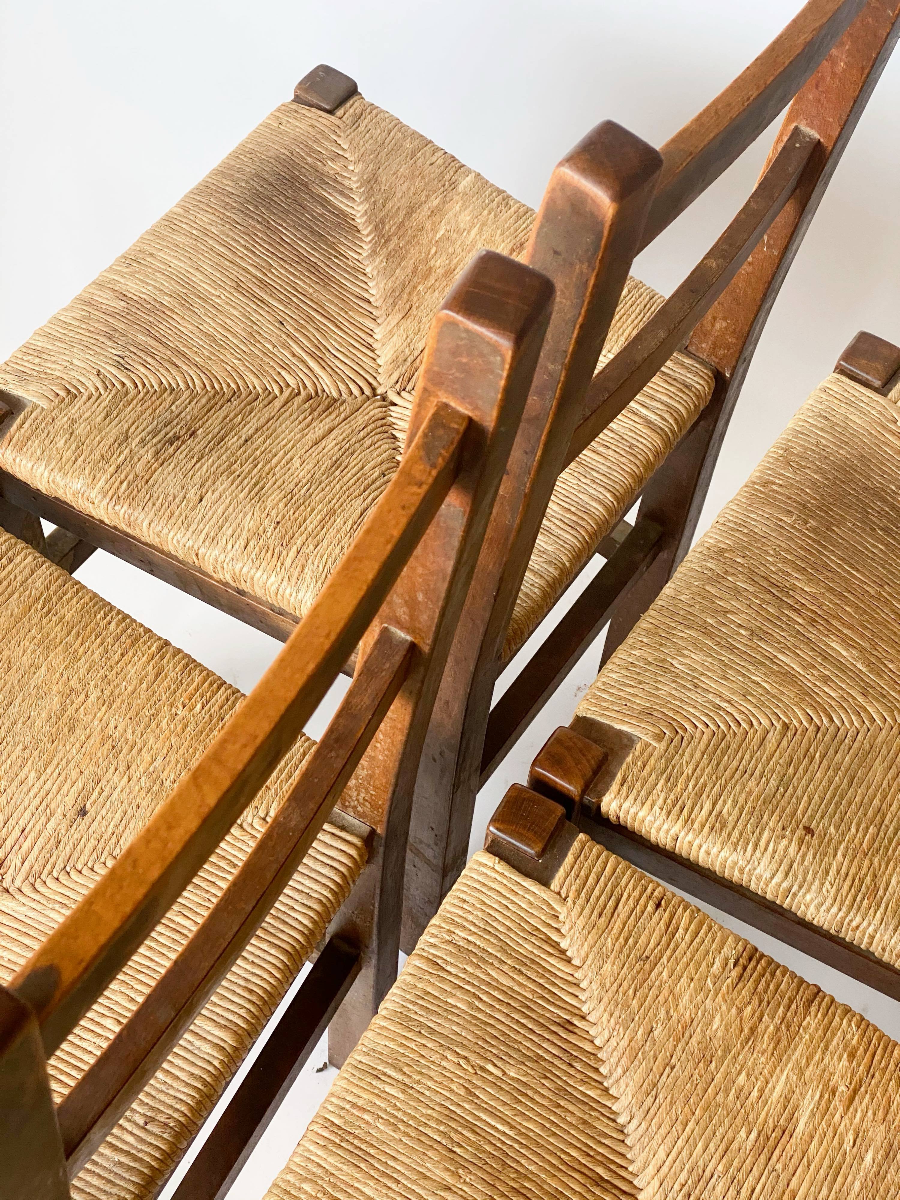 4 wooden and straw country chairs