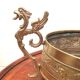Repulsed brass planter with dragon-shaped handles