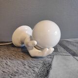 White ceramic hand sconce with white opaline globe