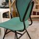 Chaise en bois cintré recouvert de vinyle, tube métal.