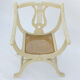 Fauteuil laqué blanc dossier lyre assise canné