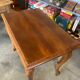 Wooden table, carved legs