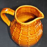 Pitcher in faience of saint clement