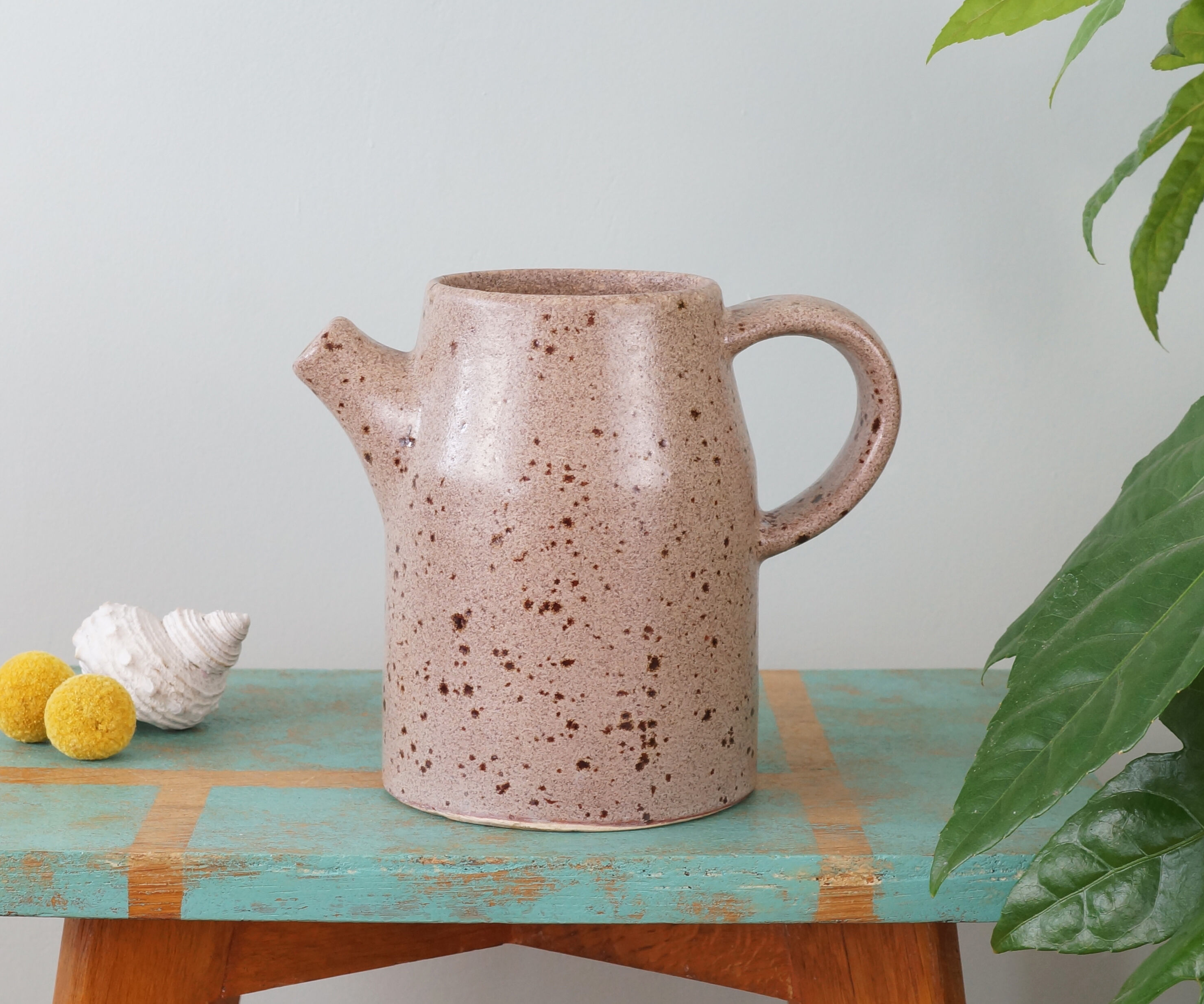 Pyrite sandstone pitcher stamped "Roman", 70s