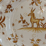 Signed Moustiers plate, in yellow shades