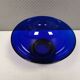 Beautiful blue glass bowl mounted on silver colored base (Original).