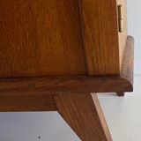 Vintage cupboard with compass feet
