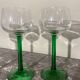 4 green stemmed glasses