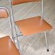 Pair of “Soudexvinyl” folding chairs in skai and chrome tube