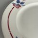 Round plate from the Céranord Saint-Amand service • Red and blue floral decoration