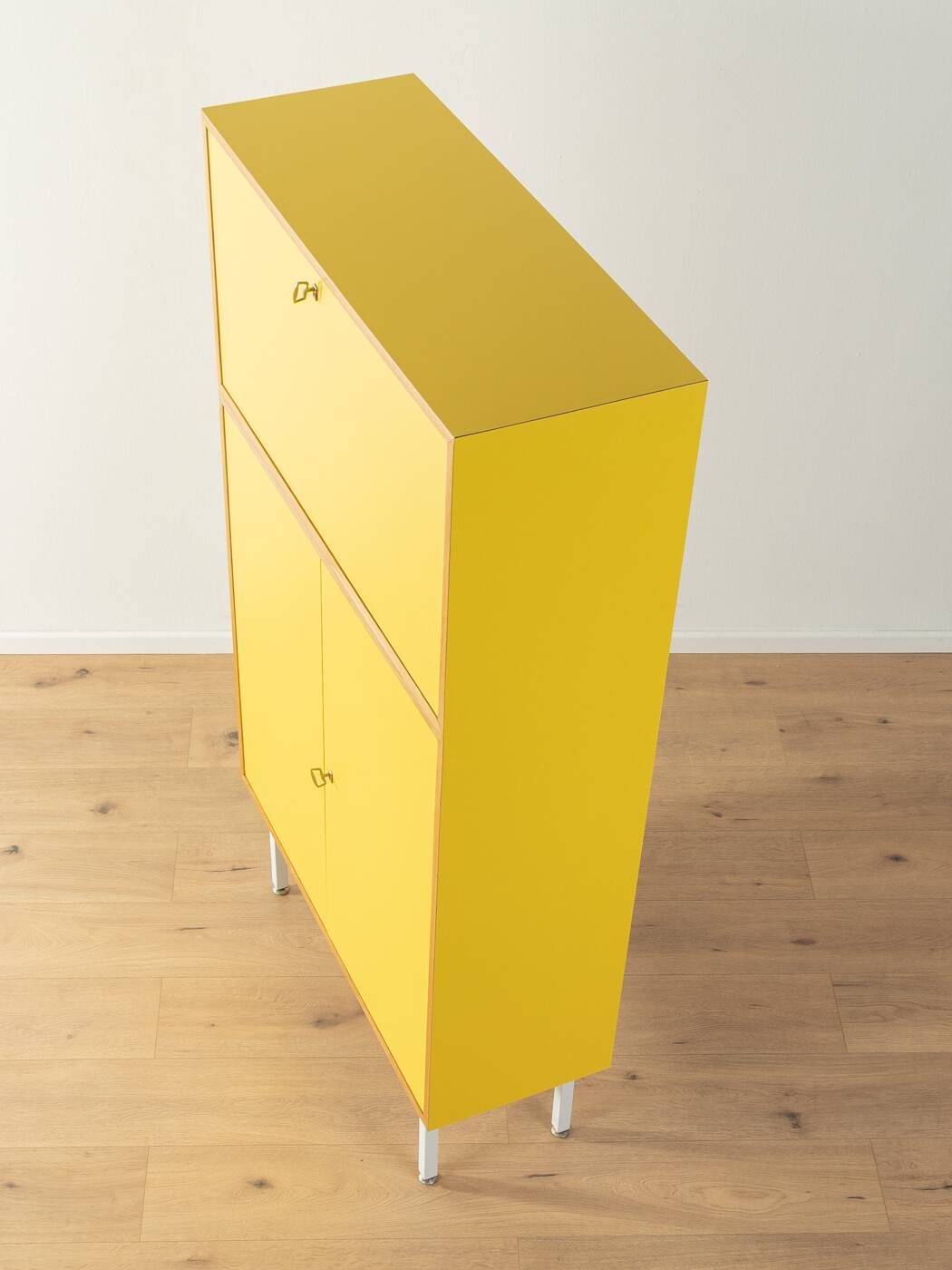 Classic sideboard from the 1960s, oak veneer, yellow Resopal, white steel feet