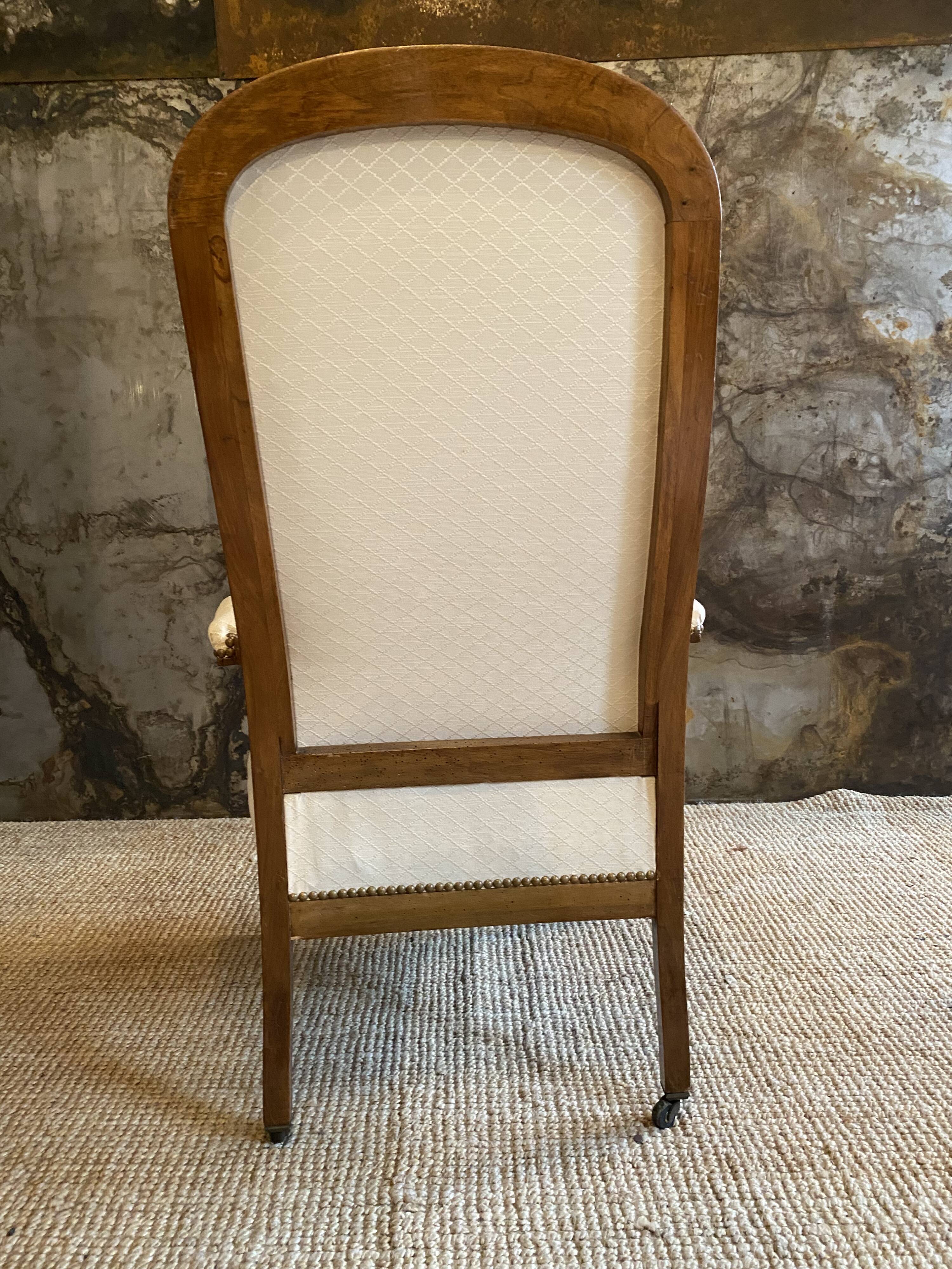 Cream voltaire armchair