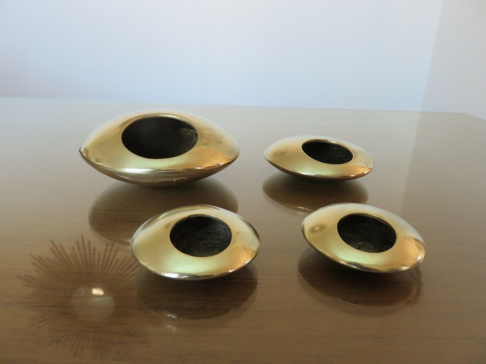 Series of 4 Scandinavian "pebble" ashtrays in bronze 70s