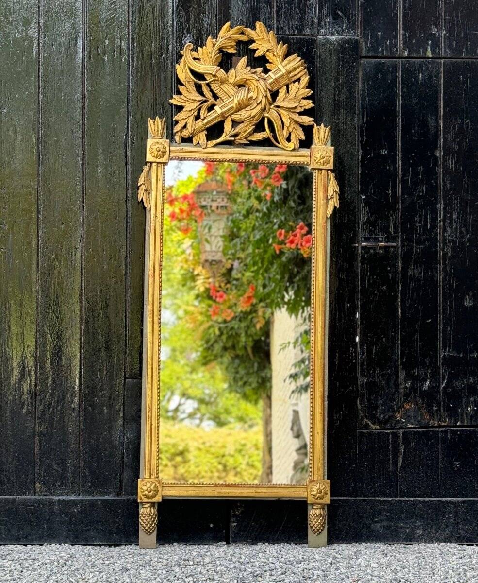 Louis XVI carved and gilded wood mirror, late 18th century