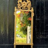 Louis XVI carved and gilded wood mirror, late 18th century