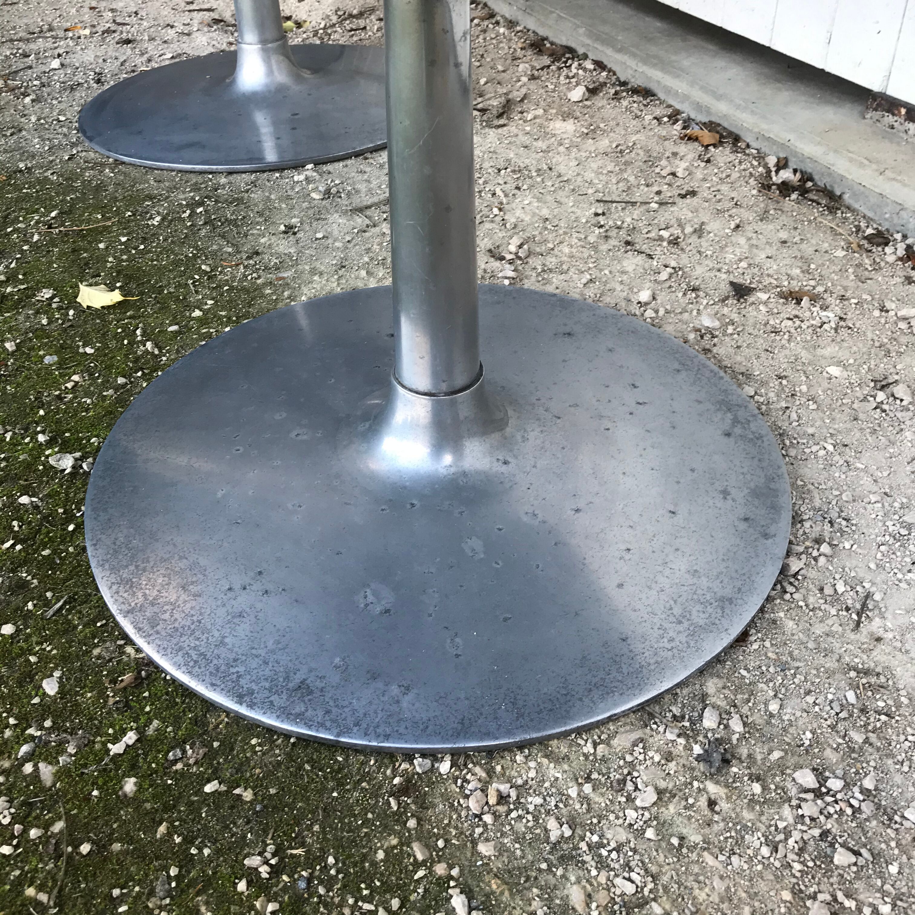 Pair of vintage armchairs with swivel tulip feet