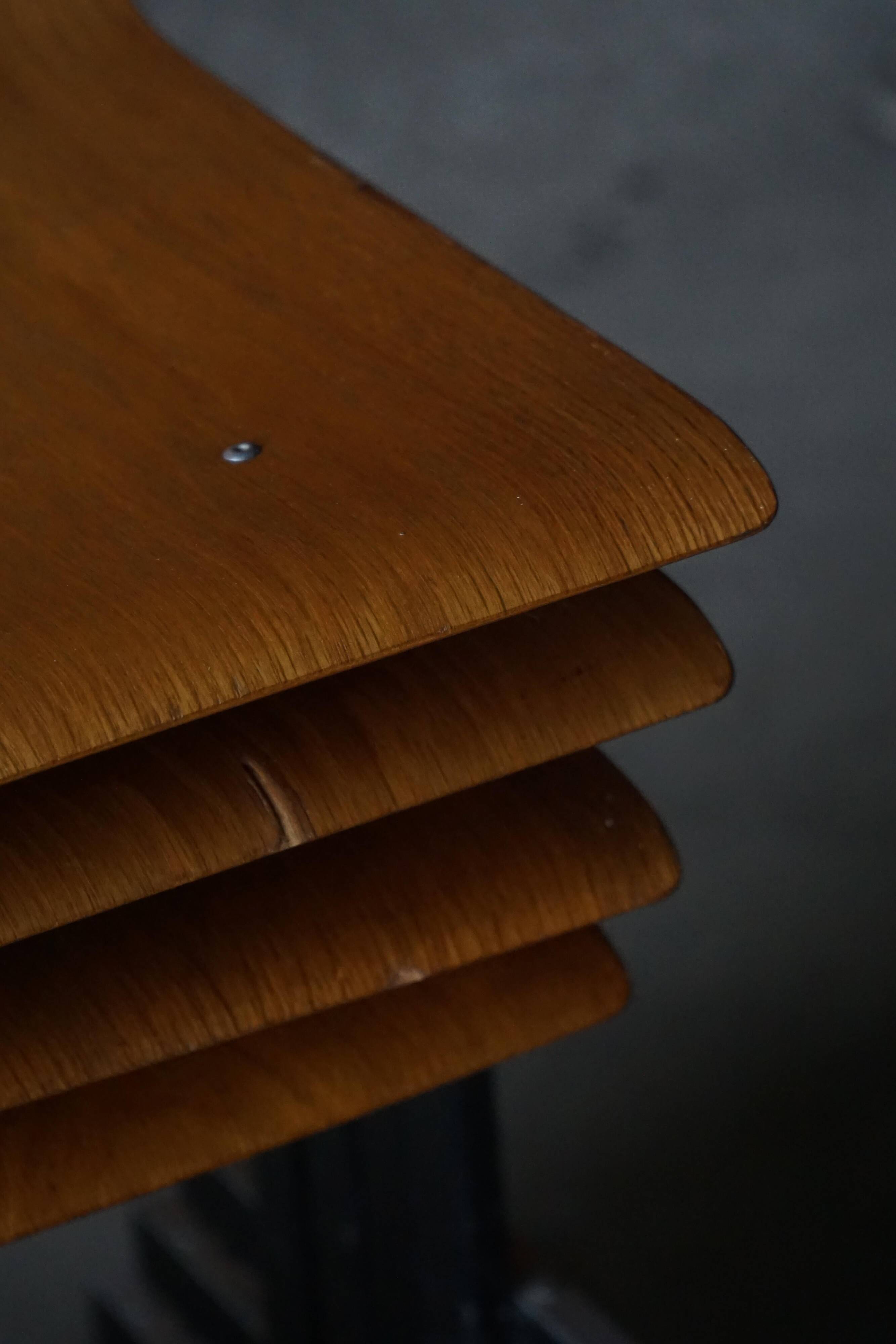 Set of 6 industrial stackable chairs by Niels Larsen, black metal and oak, 1960s.