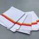 5 old tea towels in ecru linen with orange, red and yellow stripes