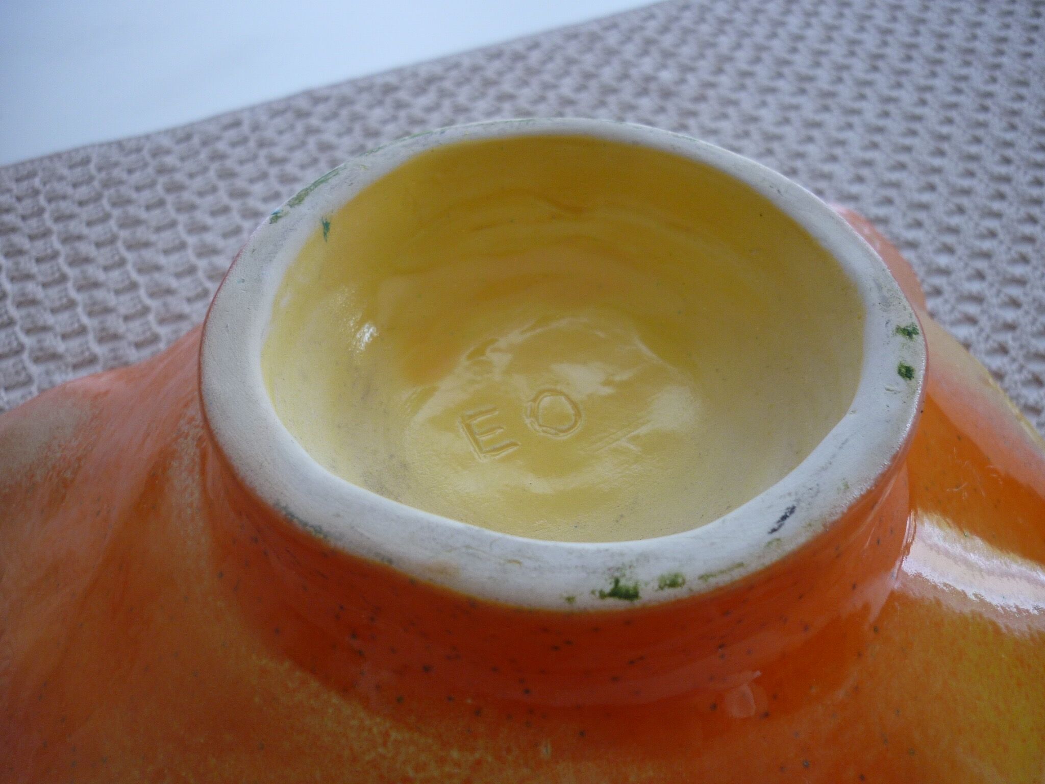 Yellow and orange ceramic salad dish