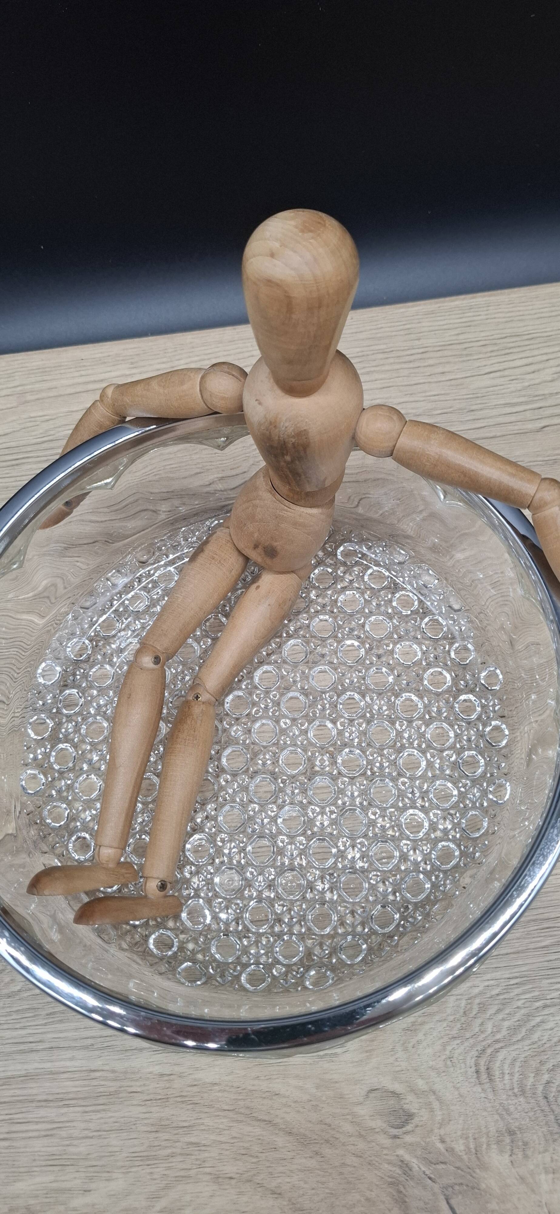 Chiseled glass salad bowl with metal rim