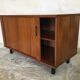 Vintage storage cabinet box on feet with sliding curtain