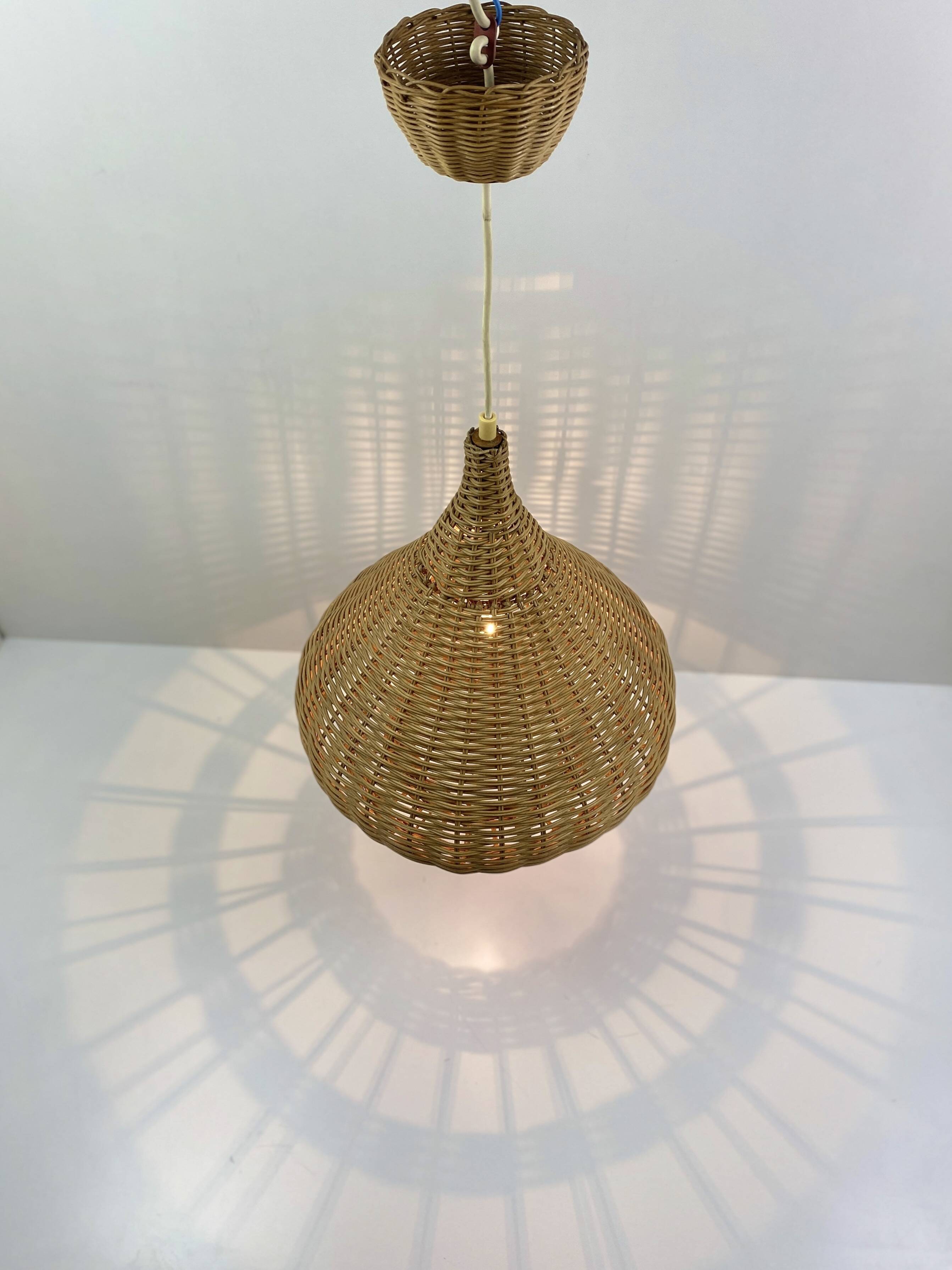 Vintage wicker pendant light from the 1960s.