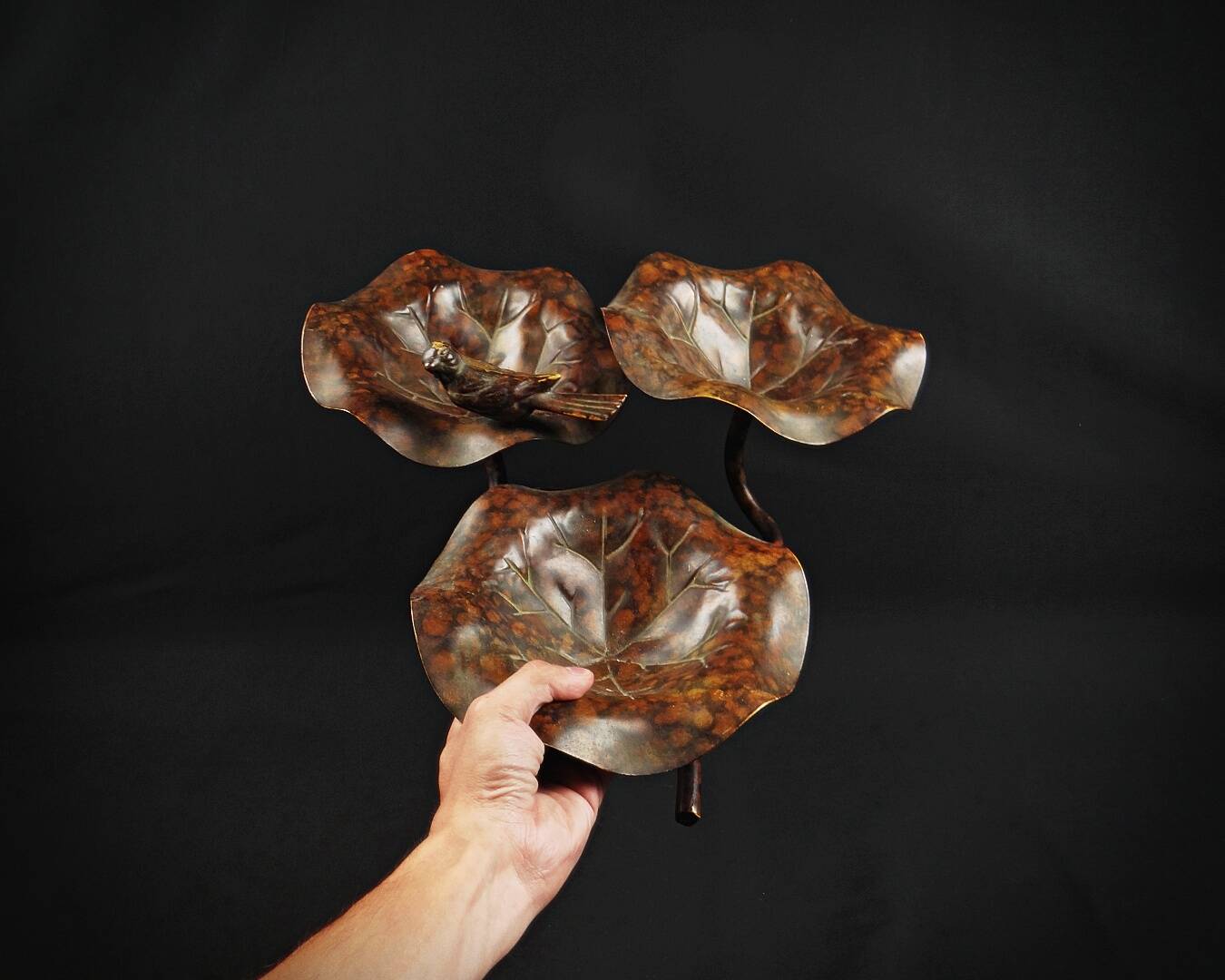 Three-tiered lotus leaf shaped patinated metal bird bath