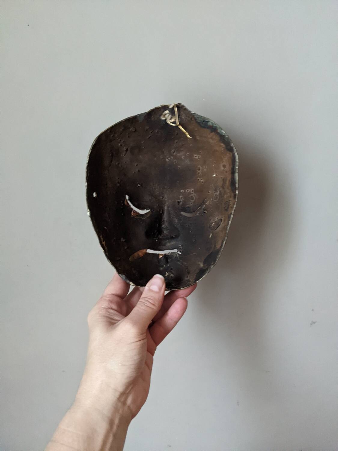 Antique bronze theatre mask Indonesia