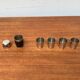 Set of 5 metal shot glasses in German owl style from the mid-century, 1960s.