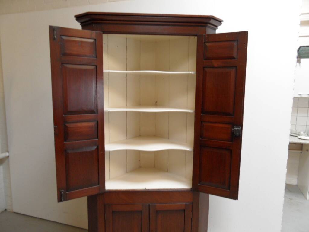 Antique mahogany corner cabinet