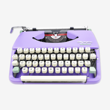 Deluxe 66 lila revised with nine tape olympia typewriter