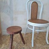 4 white rattan and cane chairs