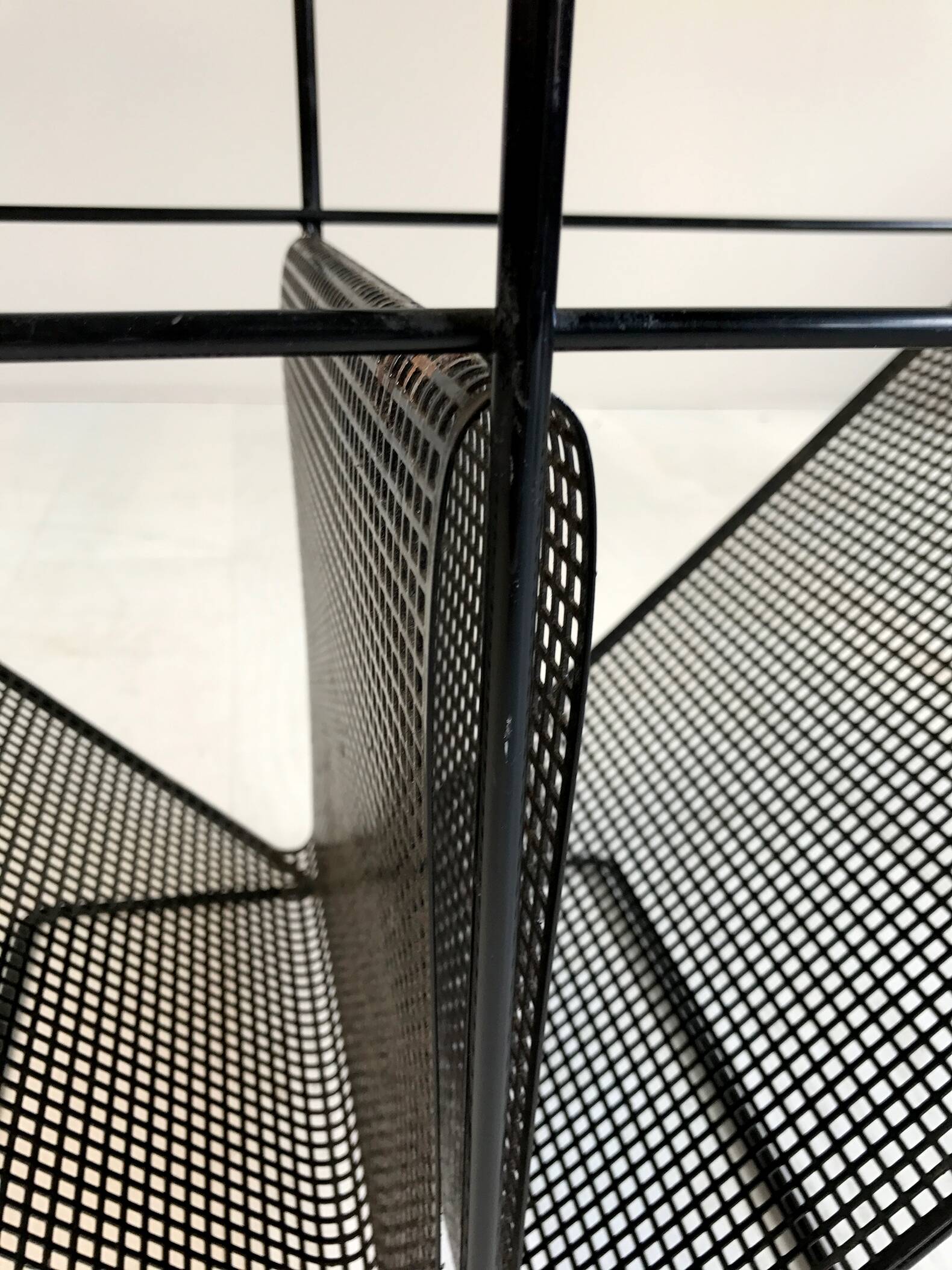 Perforated sheet metal magazine rack, 1960