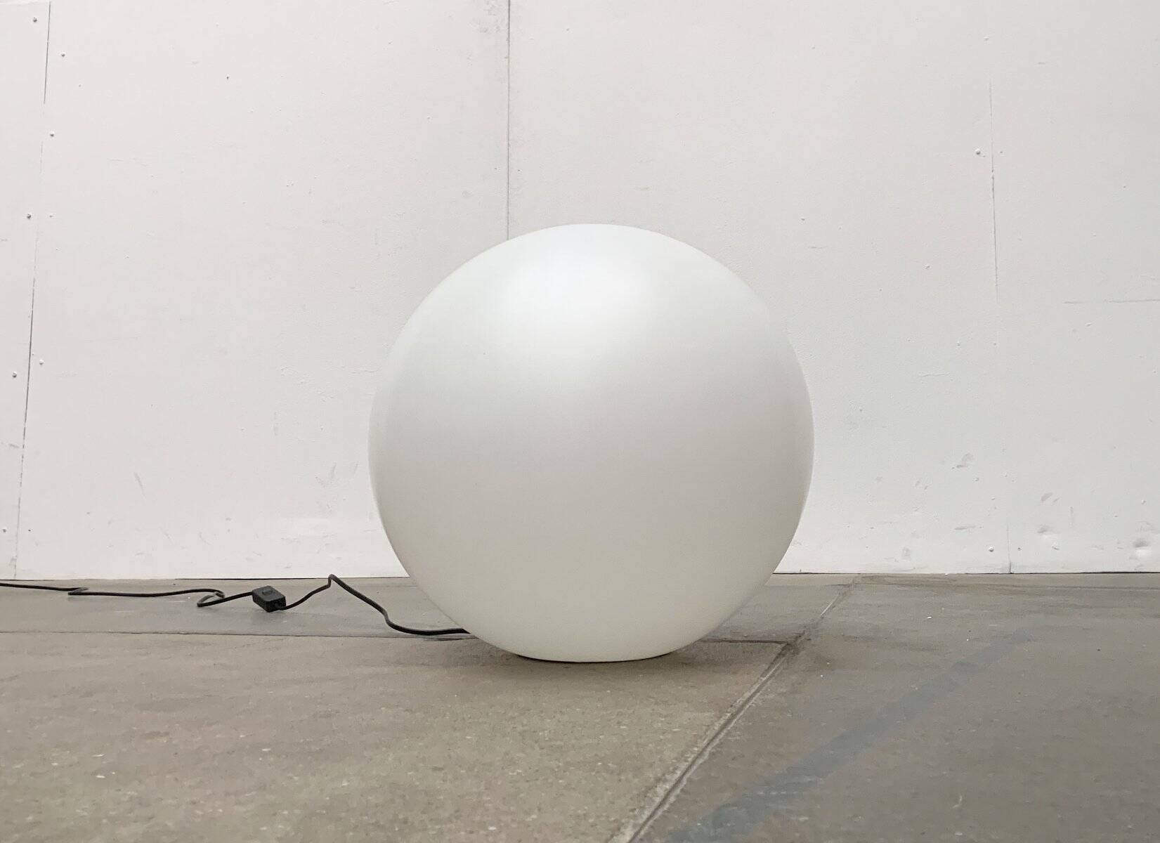 Vintage floor lamp in the shape of a globe from the French space age by SCE, France.