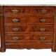 Antique Napoleon III commode in flame mahogany, with a white marble top.
